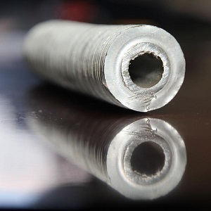Single metal finned tube in industrial application