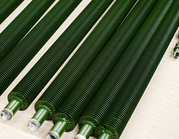 High frequency welded finned tubes in an industrial heat exchanger assembly